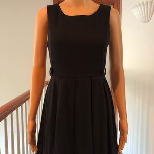 Classic LBD with pleated skirt and side details